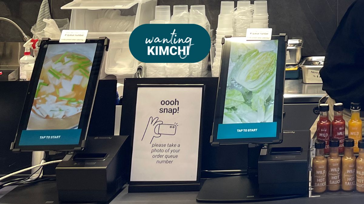Close-up view of a touchscreen menu on a self-ordering kiosk